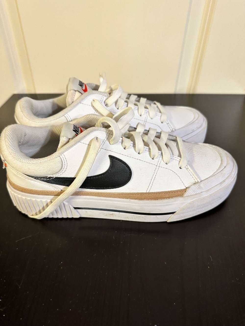 Nike Court Legacy Lift sneakers feature a prominent platform sole and a white le - Picture 2 of 7